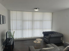 Spacious 2-Bedroom Serviced Apartment With Free Parking